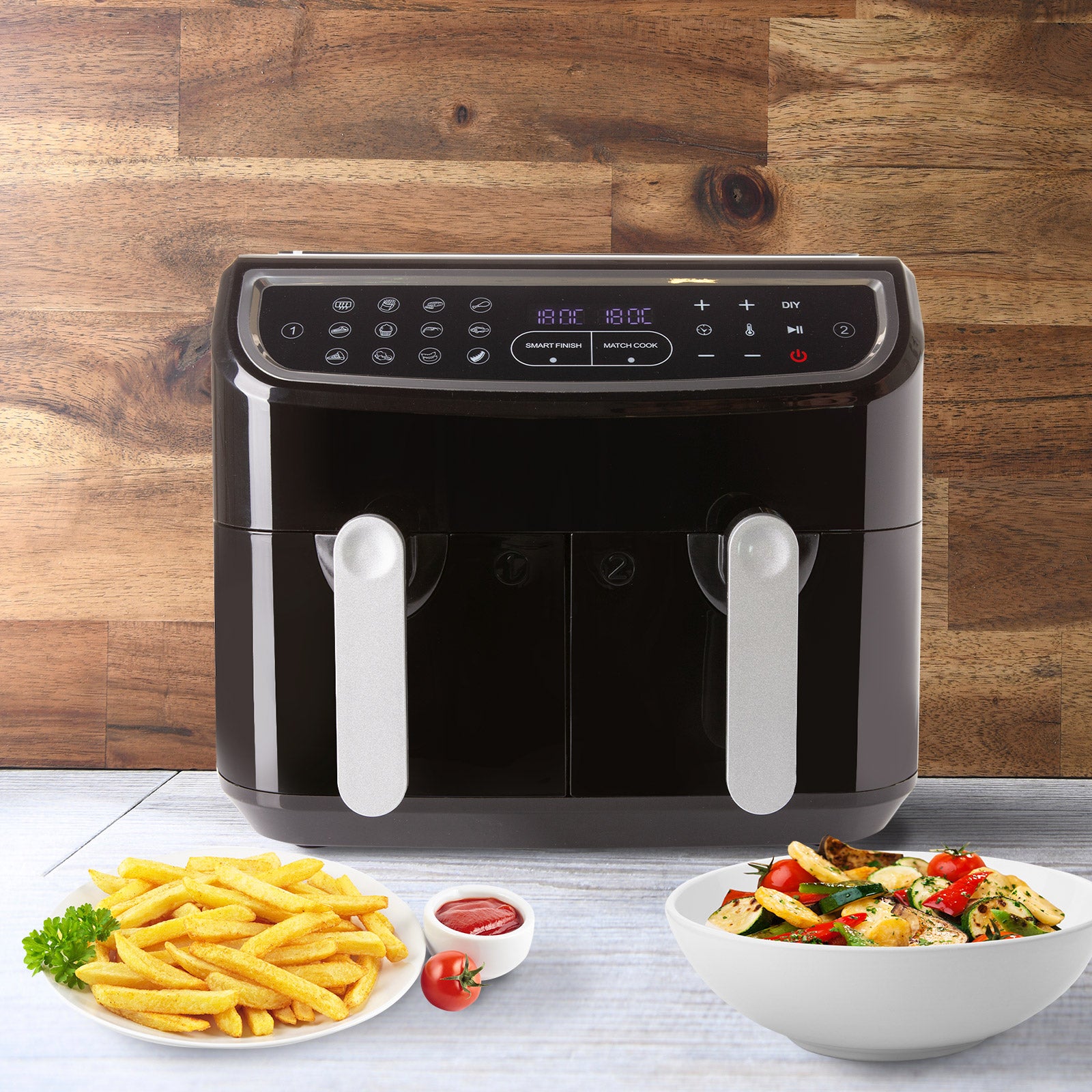 Kitchen Couture DUO 2-Basket Digital Air Fryer with LED display and two 4.5 litre baskets, showcasing its sleek black design.